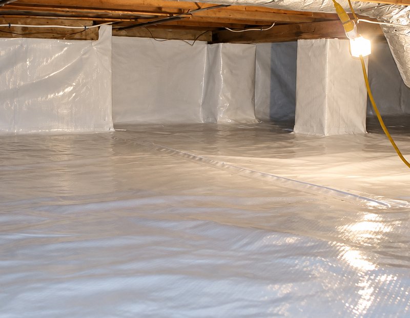 Fully encapsulated crawl space with a sealed white vapor barrier